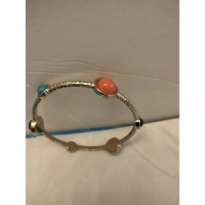 RJG CN bangle bracelet. Gold metal mixed color stones. 2.6 inches